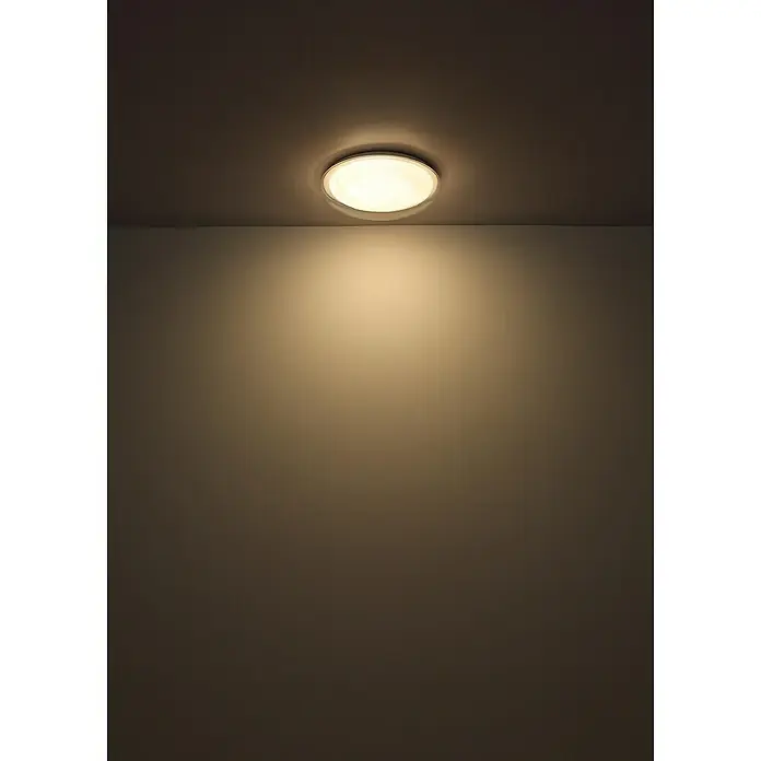 Globo LED-Deckenleuchte rund Tyrone - 24 W, Ø x H: 385 cm x 80 mm, Neutralweiß - Deckenleuchte: Nahaufnahme einer runden Deckenleuchte, die warmes Licht in einem dunklen Raum spendet.