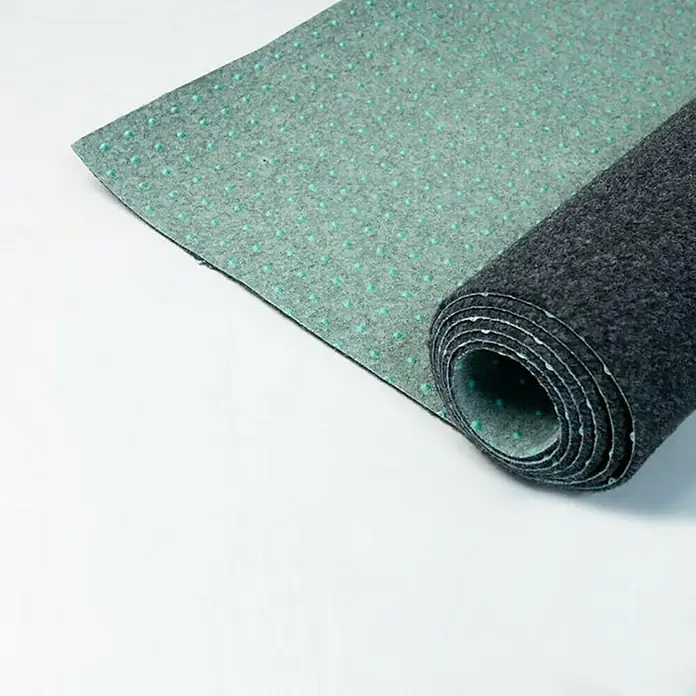 Rasenteppich Farbwunder - 1.800 x 200 cm, Schwarz, Mit Drainagenoppen - Eine Rolle grauer Teppich mit einer Unterseite mit türkisfarbenen Punkten, die für einen sicheren Halt sorgt. Ideal für Wohn- und Geschäftsräume.