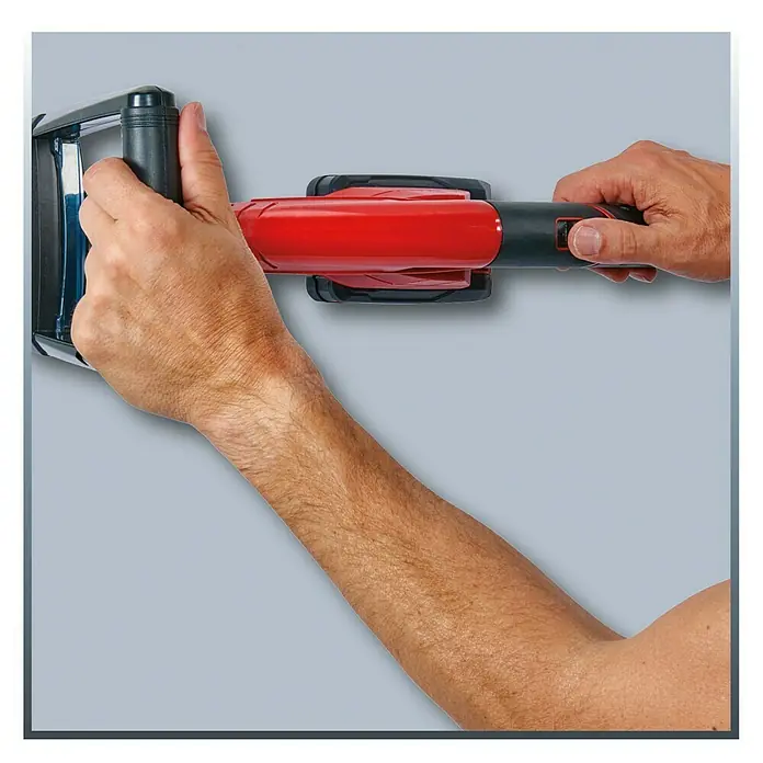 Einhell Power X-Change 18V Akku-Fugenreiniger GC-CC 18 Li-Solo - 18 V, Ohne Akku - Nahaufnahme eines Mannes, der einen Einhell Trockenbauschleifer in der Hand hält und ihn anwendet.