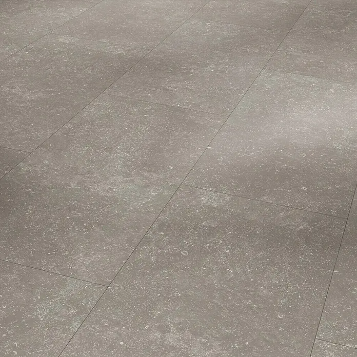 Parador Designboden Modular One - Granit grau, Landhausdiele, 853 x 400 x 8 mm - Nahaufnahme eines grauen Steinzeugfliesenbodens mit subtilen Texturen, ideal für moderne Innenräume.