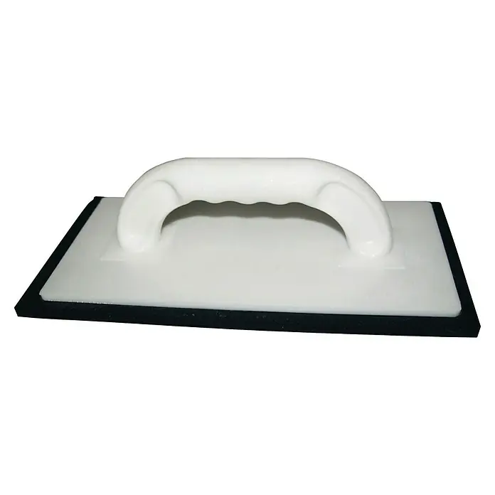 Heka Llana de alisado - 12 x 24 cm, Caucho celular - Primer plano de una llana de esponja para azulejos blanca con mango, utilizada para tareas de limpieza.
