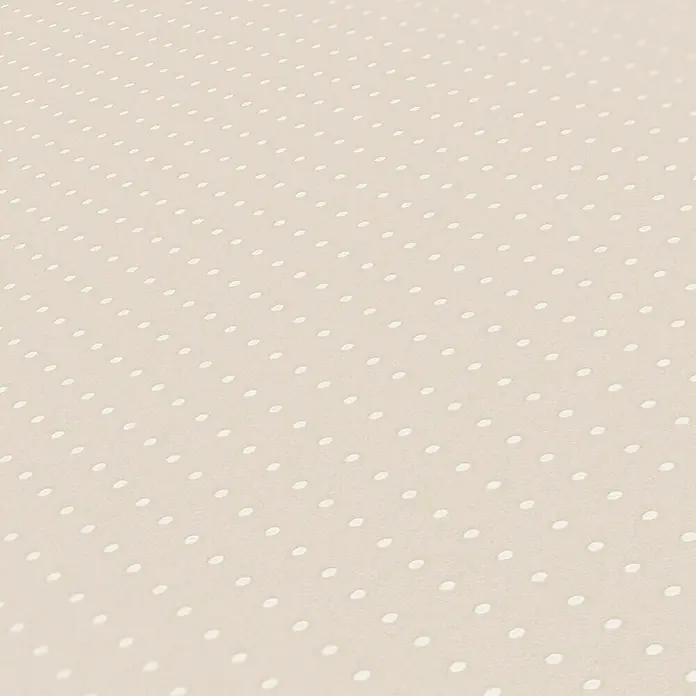 A.S. Création Maison Charme Vliestapete Punkte - Taupe-Weiß, Grafisch, 10,05 x 0,53 m - Nahaufnahme eines beigen Stoffes mit weißen Tupfenmuster, ideal für Bastelprojekte oder als Hintergrund für Produktpräsentationen.
