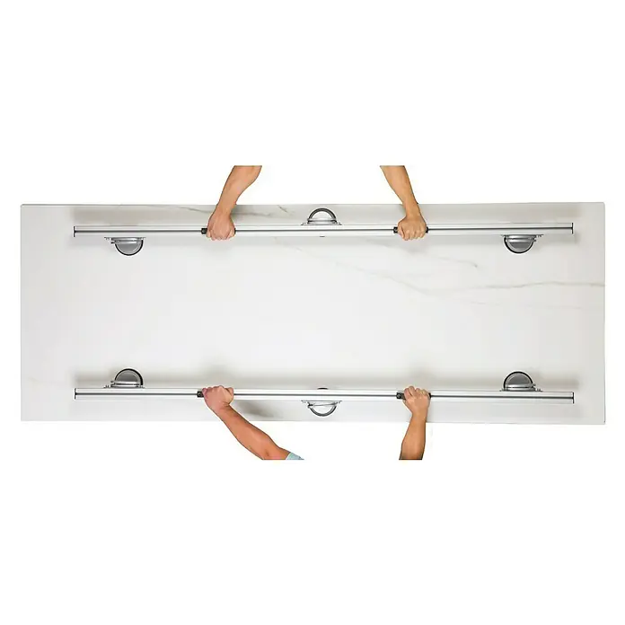 Heka Plattenheber - 2.000 mm, Aluminium - Die Bild zeigt eine innovative Marmor Tischplatte mit eingebauten Rollen, die das Bewegen erleichtern. Perfekt für flexible Raumgestaltung!
