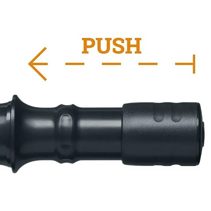 Lyra Marker Dry Profi Giant - Graphit, 150 mm - Abbildung eines schwarzen Gegenstandes mit der Beschriftung „PUSH“ und einem Pfeil, der die Richtung der Kraftanwendung angibt.