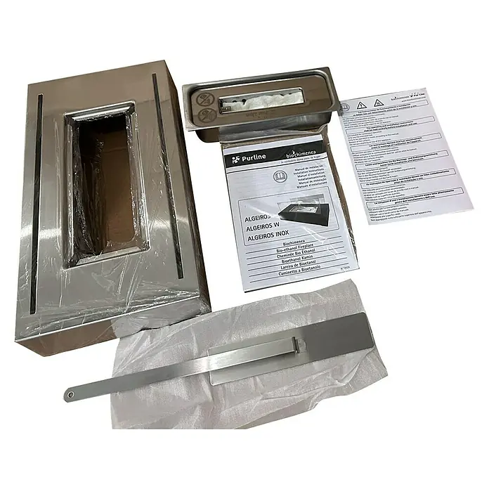 Purline Chimenea de bioetanol Algeiros - Acero inoxidable, Plateado - Primer plano de una chimenea de bioetanol Purline ALGEIROS W INOX, mostrando sus accesorios y manual, perfecta para el ambiente.