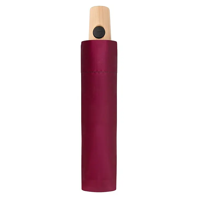 Doppler Taschenschirm Nature - Charming Wine, Durchmesser Bespannung: 97 cm, Länge: 29 cm - Nahaufnahme eines eleganten, zylindrischen Behältnisses in Burgunderrot mit einem hellen Holzdeckel und einem schwarzen Knopf, ideal für stilvolle Aufbewahrung.