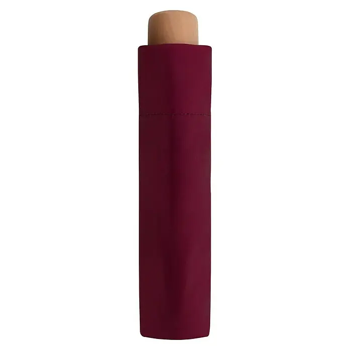 Doppler Taschenschirm Nature - Charming Wine, Durchmesser Bespannung: 96 cm, Länge: 25 cm - Nahaufnahme eines Kosmetikprodukts mit bordeauxroter Verpackung und einem naturfarbenen Holzdeckel. Ein elegantes und hochwertiges Produkt.