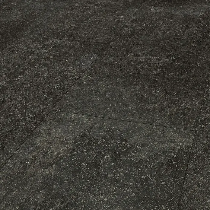 Parador Designboden Modular One - Granit anthrazit, Landhausdiele, 853 x 400 x 8 mm - Nahaufnahme von dunklen, strukturierten Bodenfliesen, die ein robustes und modernes Erscheinungsbild vermitteln.