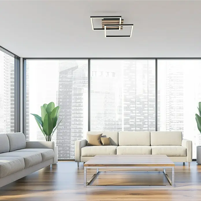 Just Light LED-Deckenleuchte Akustika - Schwarz, 15 W, IP20 - Moderne Wohnzimmeransicht mit stilvoller Deckenleuchte, hellen Sofas und großem Fenster mit Blick auf die Stadt. Elegantes Design für das Interieur.