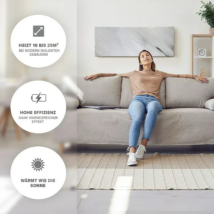 Marwona Infrarotheizkörper Infrarotheizung - 800 W, Bianco 800 Watt Smart Home - Frau entspannt sich im Wohnzimmer mit einer modernen Infrarotheizung, die Flächen von 10 bis 25 m² beheizen kann.
