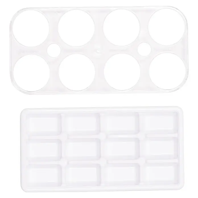 Respekta Einbaukühlschrank KS88.44-10 - Nutzinhalt Gesamt: 112 l, 54,5 x 54 x 87,5 cm, Weiß - Ein weißer Eierbehälter aus Kunststoff mit runden Aussparungen und eine rechteckige Eiswürfelform mit zwölf Fächern.