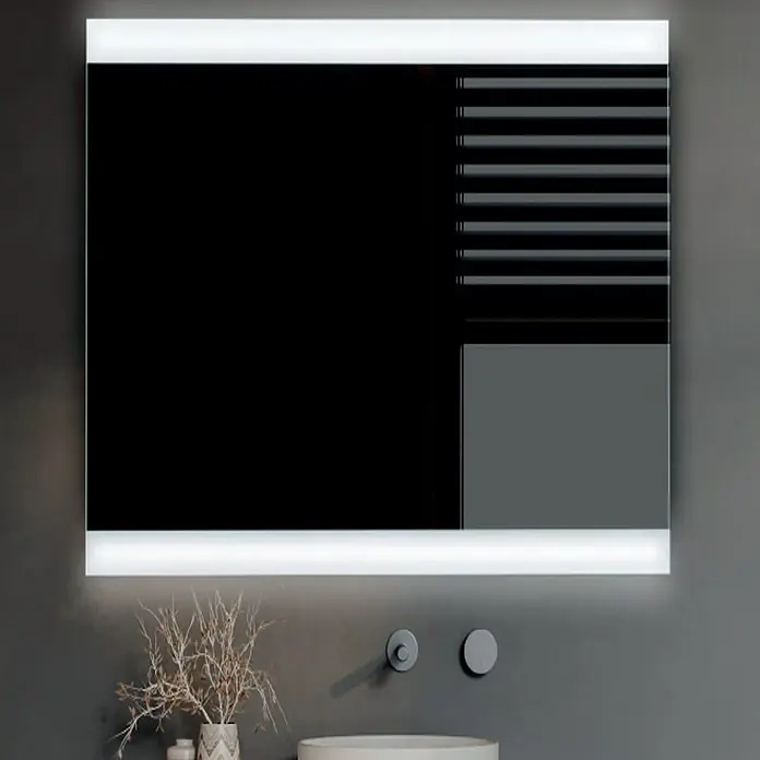 Bath Stage Espejo con luz B-932 - 80 x 70 cm, Blanco frío - Un espejo rectangular iluminado cuelga sobre un lavabo, añadiendo un toque moderno al baño.