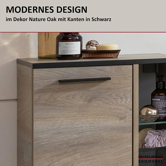 Fackelmann TE-A Midischrank - B x T x H: 47 x 32 x 94,2 cm, Nature Oak Holzoptik - Detailaufnahme eines modernen Badezimmerschranks in Nature Oak Dekor mit schwarzen Kanten, inklusive stilvoller Badaccessoires.