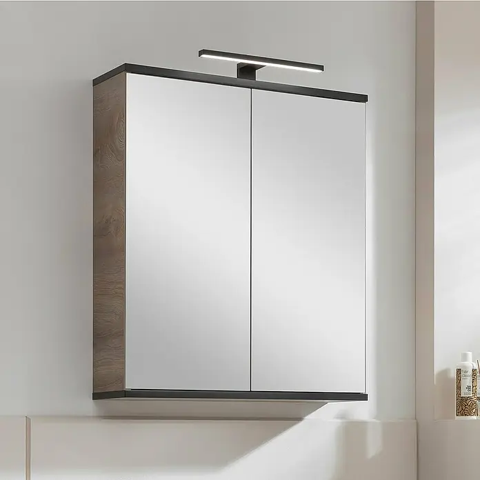 Fackelmann LED-Aufsatzleuchte - 5,6 W - Das Bild zeigt einen Hängeschrank mit Spiegeltüren, einem dunklen Rahmen und einer Holzstruktur an den Seiten, inklusive Beleuchtung.