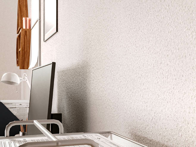 Raue Strukturfarbe an der Wand in Weiß im Büro