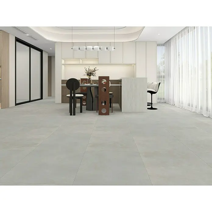 Vinylbodenmuster Rigid Fliese San Sebastian - 297 x 180 x 5,5 mm, Steinoptik - Ein modernes Esszimmer mit hellgrauem Fliesenboden, der sich elegant in das Design einfügt und dem Raum eine großzügige Weite verleiht.