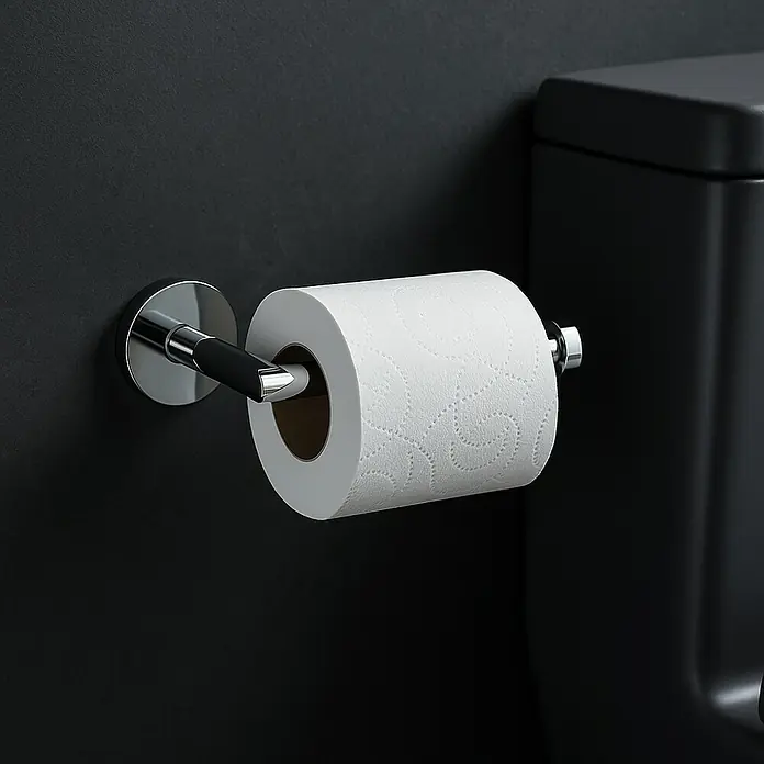 Bath Stage B-Good Portarrollos de reserva - Cromo, Brillante - Primer plano de un elegante portarrollos de papel higiénico con un rollo de papel blanco, montado en una pared oscura.