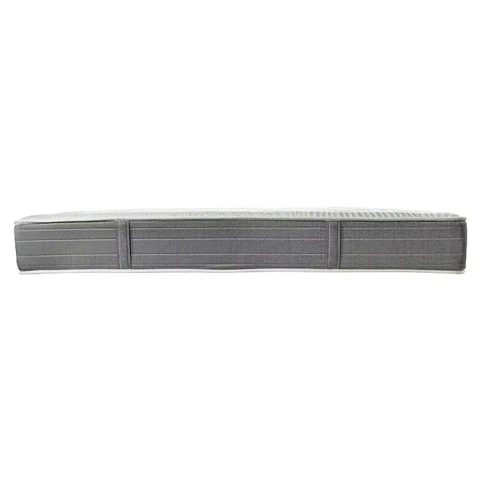 Espacio Descanso Colchón - Largo: 190 cm, Ancho: 90 cm, Altura: 26 cm, Muelles ensacados y Viscoelástica - Primer plano de un colchón gris con una funda blanca, que promete confort y un sueño de calidad.