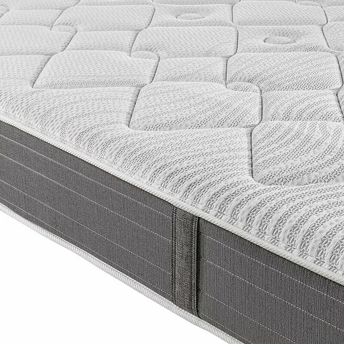Espacio Descanso Colchón - Largo: 190 cm, Ancho: 90 cm, Altura: 26 cm, Muelles ensacados y Viscoelástica - Primer plano de un colchón de alta calidad con una superficie acolchada y borde gris, prometiendo confort y soporte para el descanso.
