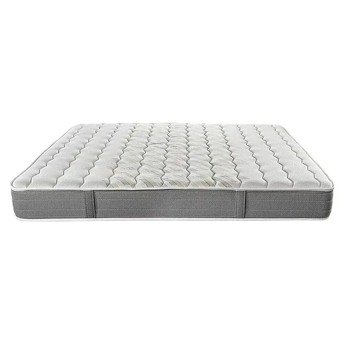 Espacio Descanso Colchón - Largo: 190 cm, Ancho: 90 cm, Altura: 24 cm, Espuma HR y Viscoelástica, Colchón a 2 caras - Esta imagen muestra un primer plano de un colchón, con una parte superior acolchada y un borde de soporte. Ofrece comodidad y apoyo para un sueño reparador.