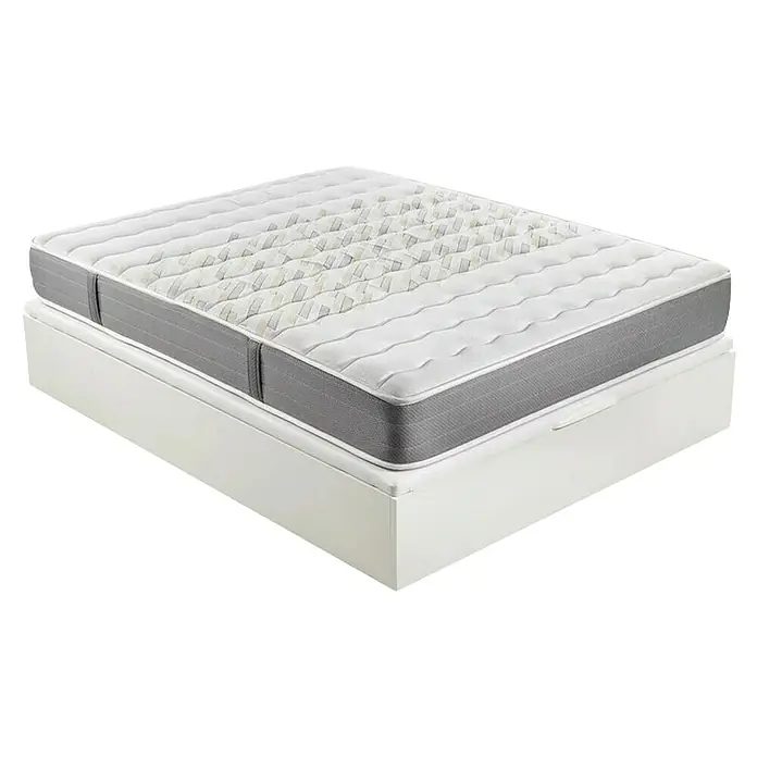 Espacio Descanso Canapé y colchón - L x An x Al: 190 x 90 x 56 cm, Blanco, Abatible, Espuma HR y Viscoelástica - Primer plano de un colchón sobre un marco de cama, que ofrece comodidad y soporte para un sueño reparador.