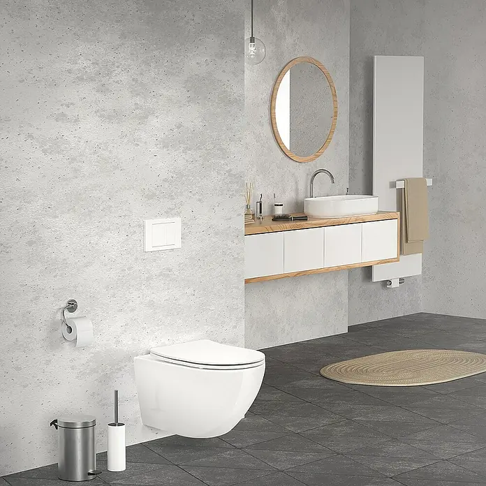 LuxeBath Wand-WC Weiß mit Nano Beschichtung lang Tiefspüler Lotus Effekt - Weiß - Modernes Badezimmer mit wandhängendem WC, Waschbecken mit Unterschrank und runden Spiegel. Die grauen Wände verleihen dem Raum eine elegante Note.