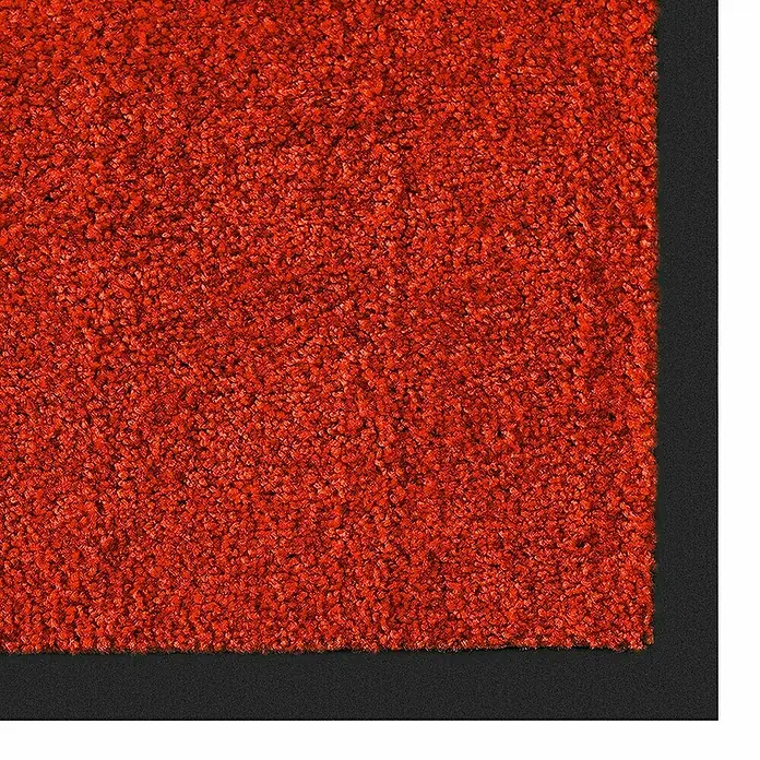 Fußmatte Rhine - Rot, 180 x 120 cm, 100 % Polyamid - Nahaufnahme einer roten Fußmatte mit schwarzem Rand. Ideal für Eingangs- und Innenbereiche.