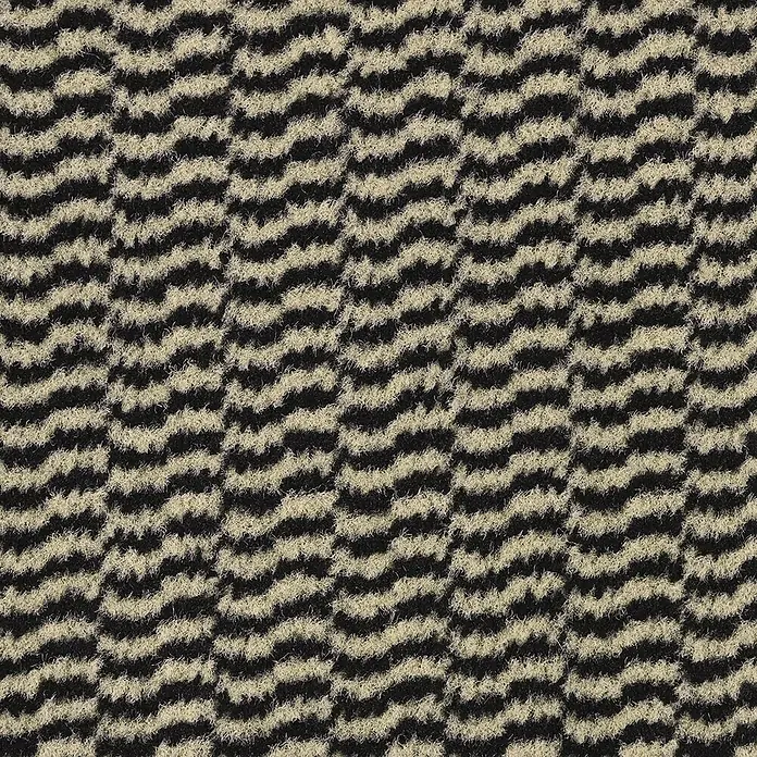 Fußmatte Sky Novo - Ocker/Schwarz, 120 x 90 cm, 100 % Polypropylen - Nahaufnahme eines Teppichs mit einem gewellten schwarz-beige Muster für eine stilvolle und komfortable Bodengestaltung.