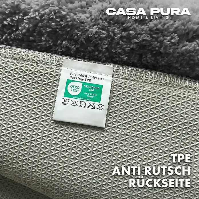 Floordirekt Badteppich Sky - 120 x 70 cm, Dunkelgrau, 100% Polyester - Detailansicht eines grauen Casa Pura Teppichs mit TPE-Rückseite und Öko-Tex Standard 100 Zertifizierung.
