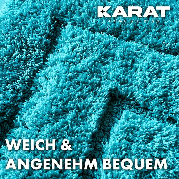 Floordirekt Badteppich Atlantis - 120 x 70 cm, Türkis, 100% Polyester - Nahaufnahme eines flauschigen, türkisfarbenen "Karat Home & Living" Teppichs, der Weichheit und Komfort verspricht.