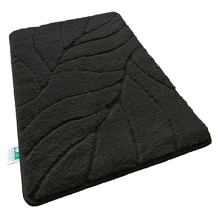 Floordirekt Badteppich Maris - 60 x 40 cm, Schwarz, 100% Polyester - Ein rechteckiger, schwarzer Badteppich mit einem eingearbeiteten Blattmuster für ein stilvolles Badezimmerambiente.