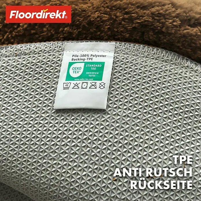 Floordirekt Badteppich Sky - 95 x 95 cm, Braun, 100% Polyester - Nahaufnahme der rutschfesten TPE-Rückseite eines Teppichs mit OEKO-TEX-Zertifizierung für Schadstofffreiheit und hautfreundliche Materialien.
