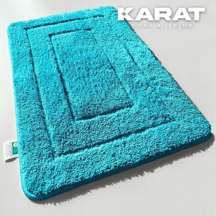 Floordirekt Badteppich Atlantis - 120 x 70 cm, Türkis, 100% Polyester - Türkisfarbene Badematte der Marke Karat Home & Living. Die Matte ist weich und hat einen rechteckigen, gestuften Look.