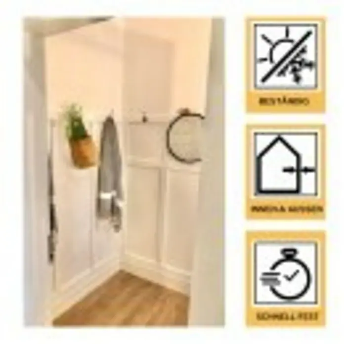 DuBaust Montagekleber Montagekleber - 445 g, Kartusche - Wandpaneel mit Hakenleiste und Dekor. Der Flur ist in Weiß gehalten und mit Holzboden ausgestattet. Dekorative Elemente lockern den Raum auf.