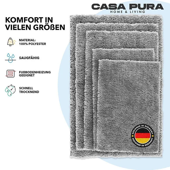 Floordirekt Badteppich Sky - 120 x 70 cm, Silbergrau, 100% Polyester - Ein Stapel grauer, flauschiger Badteppiche von Casa Pura in verschiedenen Größen, designed in Deutschland.