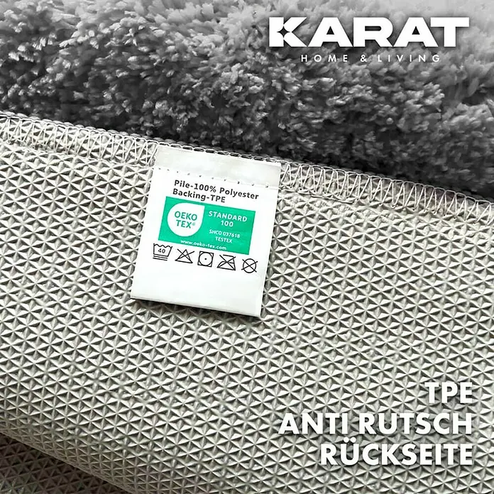 Floordirekt Badteppich Atlantis - 100 x 60 cm, Silbergrau, 100% Polyester - Detailaufnahme eines grauen Teppichs mit TPE-Rutschschutz und Öko-Tex Standard 100 Zertifikat für hohe Qualität und Sicherheit.
