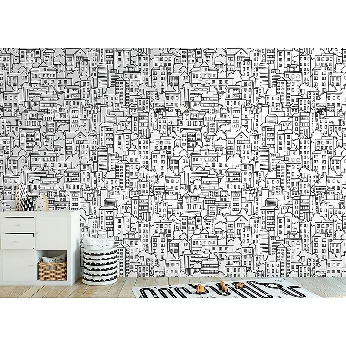 A.S. Création The Wall 3 Fototapete Häuser - B x H: 159 x 280 cm, Vlies - Ein Kinderzimmer mit einer weißen Kommode, Spielzeug und einer Wand mit einem Stadtmotiv.