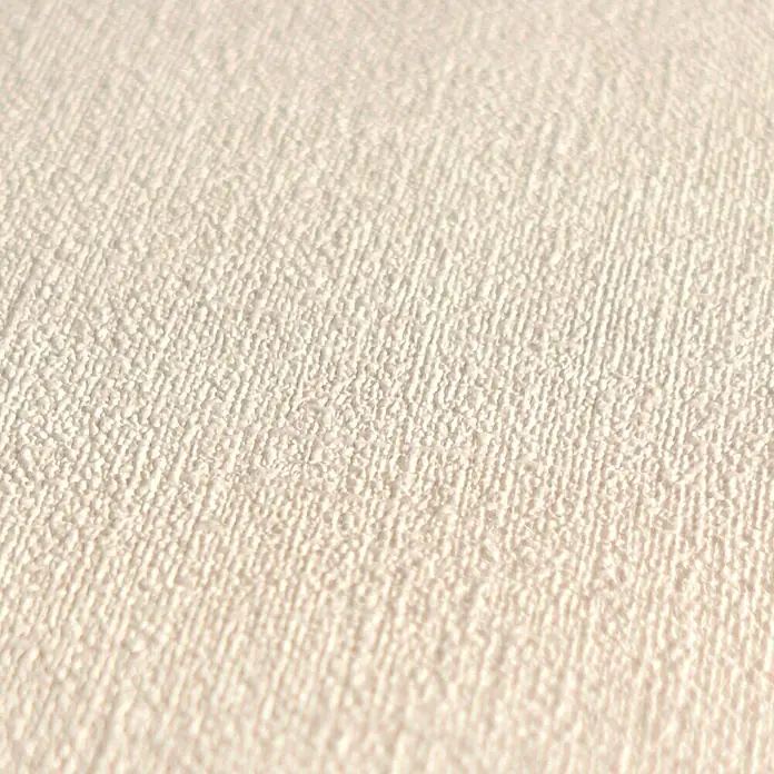 A.S. Création Metropolitan Stories Hot Spots Vliestapete - Creme-Beige, Uni, 10,05 x 0,53 m - Nahaufnahme einer strukturierten, cremefarbenen Tapete, die eine subtile, elegante Textur für Wände bietet.