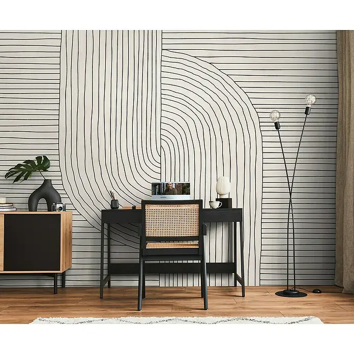 A.S. Création The Wall 3 Fototapete Bewegte Formen - B x H: 371 x 280 cm, Vlies - Elegantes Interieur mit modernem Schreibtisch und Stuhl, akzentuiert durch eine stilvolle Stehlampe und eine dekorative Kommode.