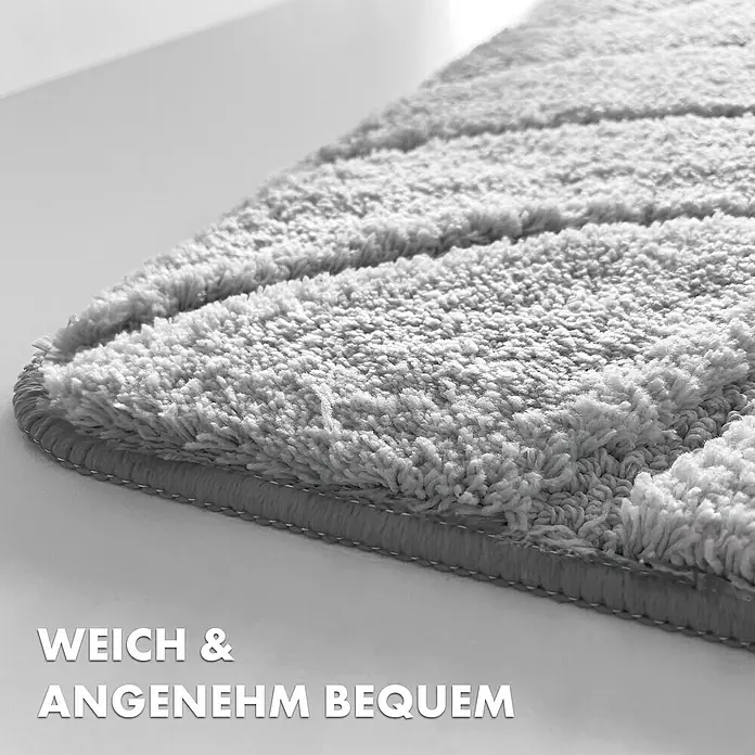 Floordirekt Badteppich Maris - 150 x 80 cm, Silber, 100% Polyester - Nahaufnahme einer weichen, grauen Badematte mit strukturiertem Design und angenehmer Textur für Komfort und Stil im Badezimmer.