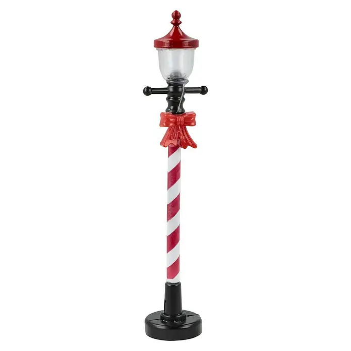 LED-Weihnachtsdorf Lebkuchenhaus - 9,5 x 9,5 x 13 cm, LED, Batteriebetrieben - Dekorativer Weihnachtslichterpfosten mit rot-weißen Streifen und einer roten Schleife, ideal für festliche Dekorationen.