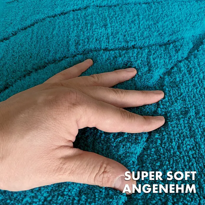 Floordirekt Badteppich Maris - 120 x 60 cm, Türkis, 100% Polyester - Detailaufnahme eines türkisfarbenen, superweichen Badvorlegers mit OEKO-TEX® Zertifikat, der sich angenehm anfühlt.