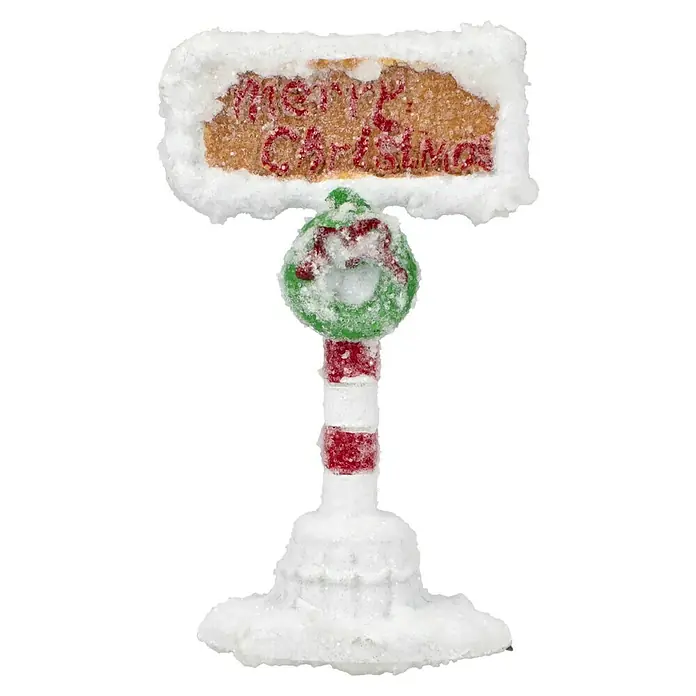 LED-Weihnachtsdorf Lebkuchenhaus - 9,5 x 9,5 x 13 cm, LED, Batteriebetrieben - Ein weihnachtlicher Miniatur-Wegweiser mit der Aufschrift "Merry Christmas", geschmückt mit Schnee und einem festlichen Kranz.
