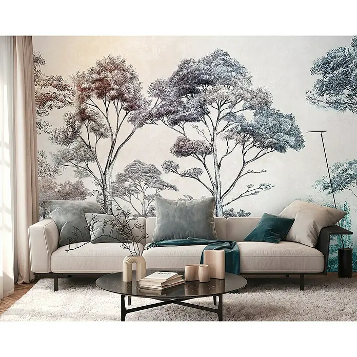 A.S. Création The Wall 3 Fototapete Bäume - B x H: 371 x 280 cm, Vlies - Wohnzimmer mit beigem Sofa, Zierkissen und Couchtisch, vor einer Wandtapete mit Baumdesign. Das Sofa ist einladend und stilvoll.