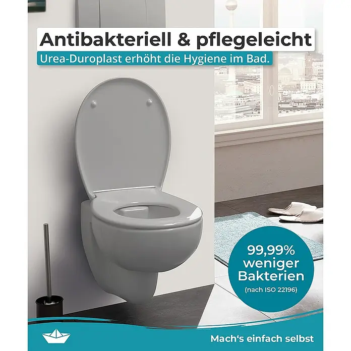 Calmwaters WC-Sitz Original - Duroplast, Grau, Mit Absenkautomatik - Das Bild zeigt eine wandhängende Toilette aus Urea-Duroplast, die antibakteriell und pflegeleicht ist und für mehr Hygiene im Badezimmer sorgt.