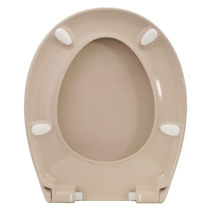 Calmwaters WC-Sitz Original - Duroplast, Beige, Mit Absenkautomatik - Nahaufnahme eines beigen WC-Sitzes mit weißen Puffern und Scharnieren.
