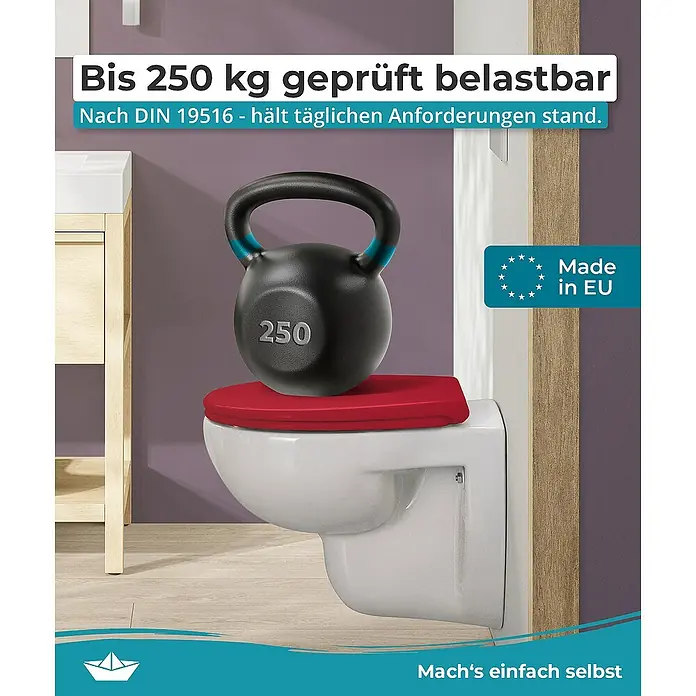 Calmwaters WC-Sitz Original - Duroplast, Rot, Mit Absenkautomatik - Das Bild zeigt eine Toilette, die mit einem 250 kg schweren Gewicht belastet wird, um ihre Stabilität und Belastbarkeit zu demonstrieren.