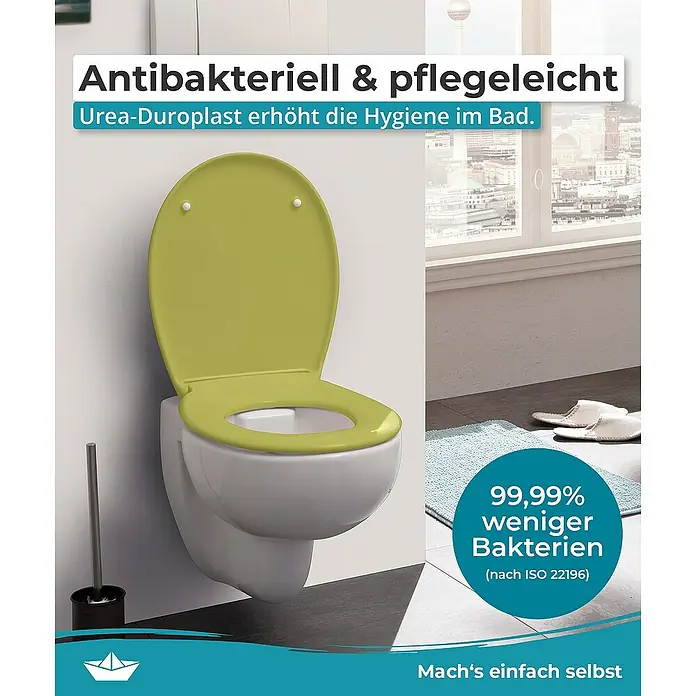 Calmwaters WC-Sitz Original - Duroplast, Grün, Mit Absenkautomatik - Das Bild zeigt eine Nahaufnahme einer Toilette mit antibakteriellem und pflegeleichtem Urea-Duroplast-Sitz in einem modernen Badezimmer.