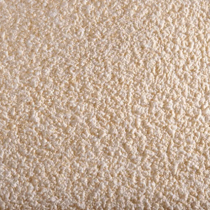 Floxxan Baumwollputz California 217 - Putz Tapete Flüssigtapete Gold - Gold, 1 kg, Lösemittelfrei - Nahaufnahme einer strukturierten, beigen Putzoberfläche, die eine rustikale und warme Ästhetik für Innenräume bietet.