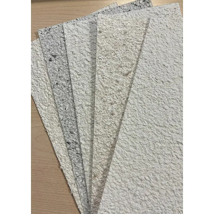 Floxxan Baumwollputz Montana 518 Cellulose - Putz Tapete Flüssigtapete Salbei - Salbei, 1 kg, Lösemittelfrei - Muster von Flüssigtapeten in verschiedenen Farben und Texturen, die die Vielfalt der Wandgestaltung zeigen.